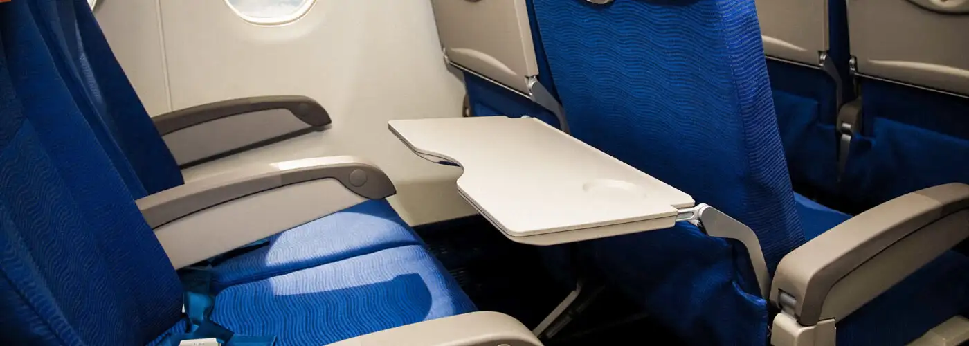 airplane seats empty tray table down