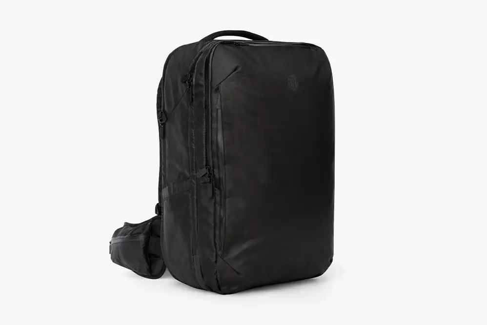 Best Alternative to Carry-on Suitcase - Tortuga Travel Backpack 40L on light grey background