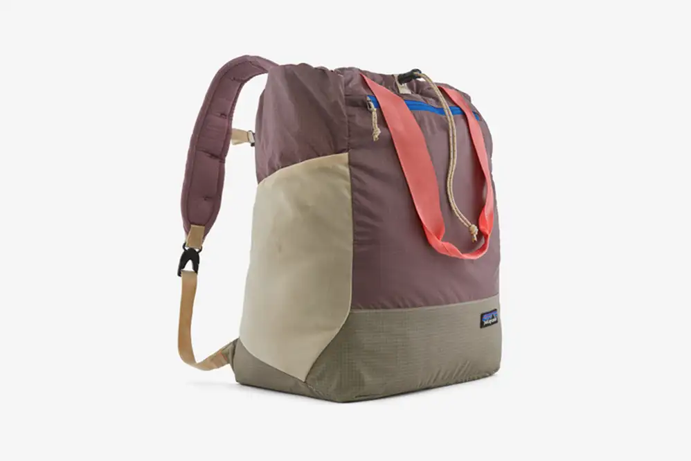 Best Convertible Travel Backpack - Patagonia Ultralight Black Hole 27L Tote Pack on light grey background